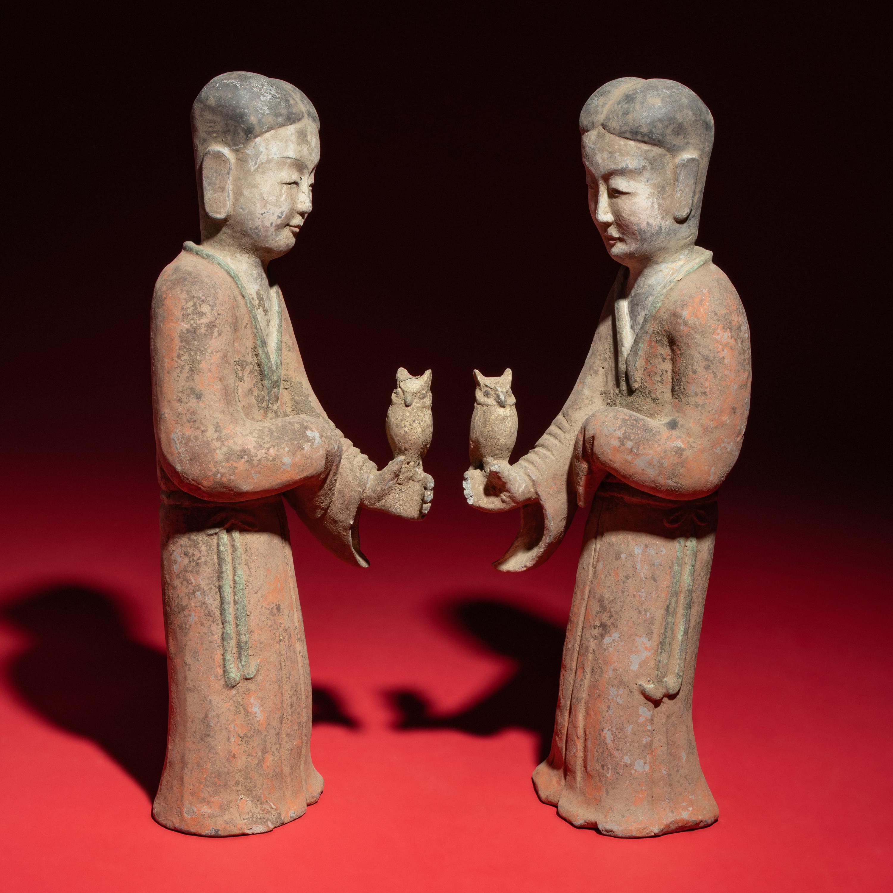 A Pair of Chinese Painted Grey Pottery Ladies with Owls, Han Dynasty — 漢 灰陶彩繪持鷹女俑一對