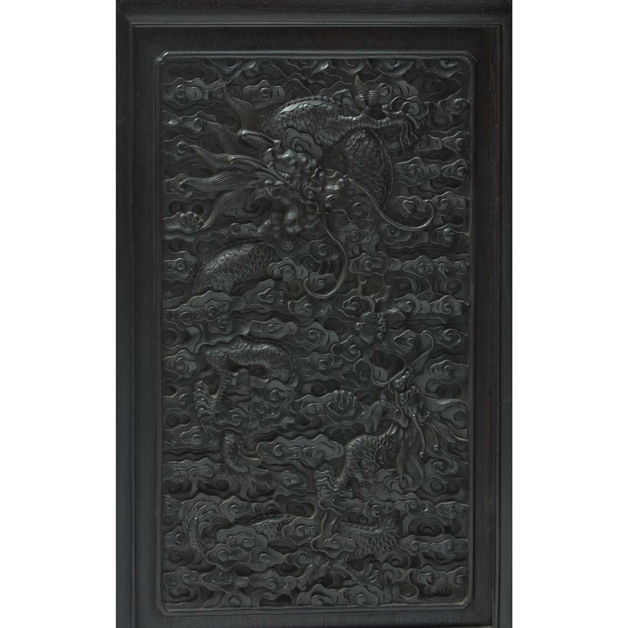 A Chinese carved hardwood six-panel “Dragons” screen 硬木浮雕龙纹六开屏风