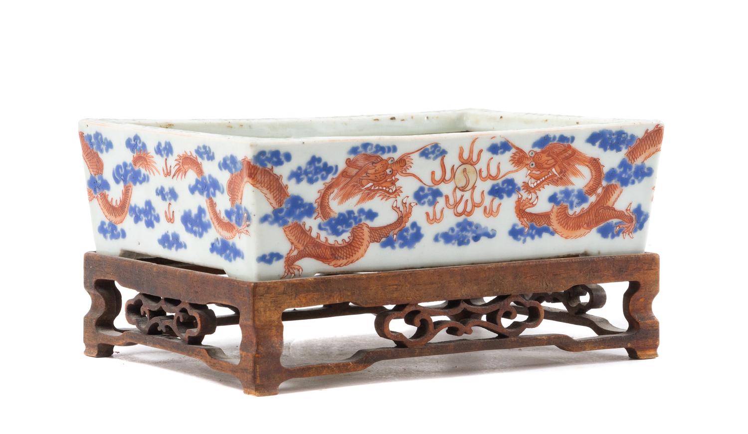 A Blue and Iron Red Porcelain Cachepot Length 7 1/2 inches.