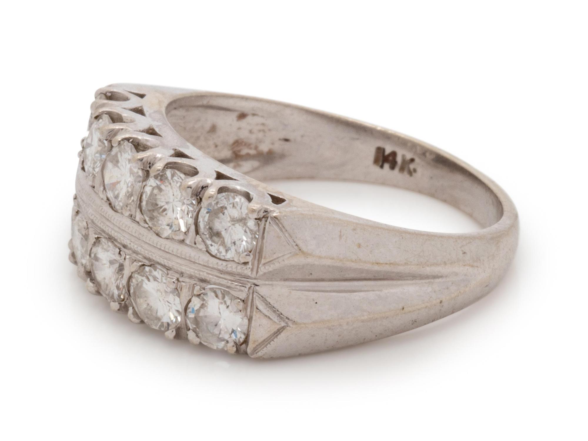 A 14 Karat White Gold and Diamond Ring,