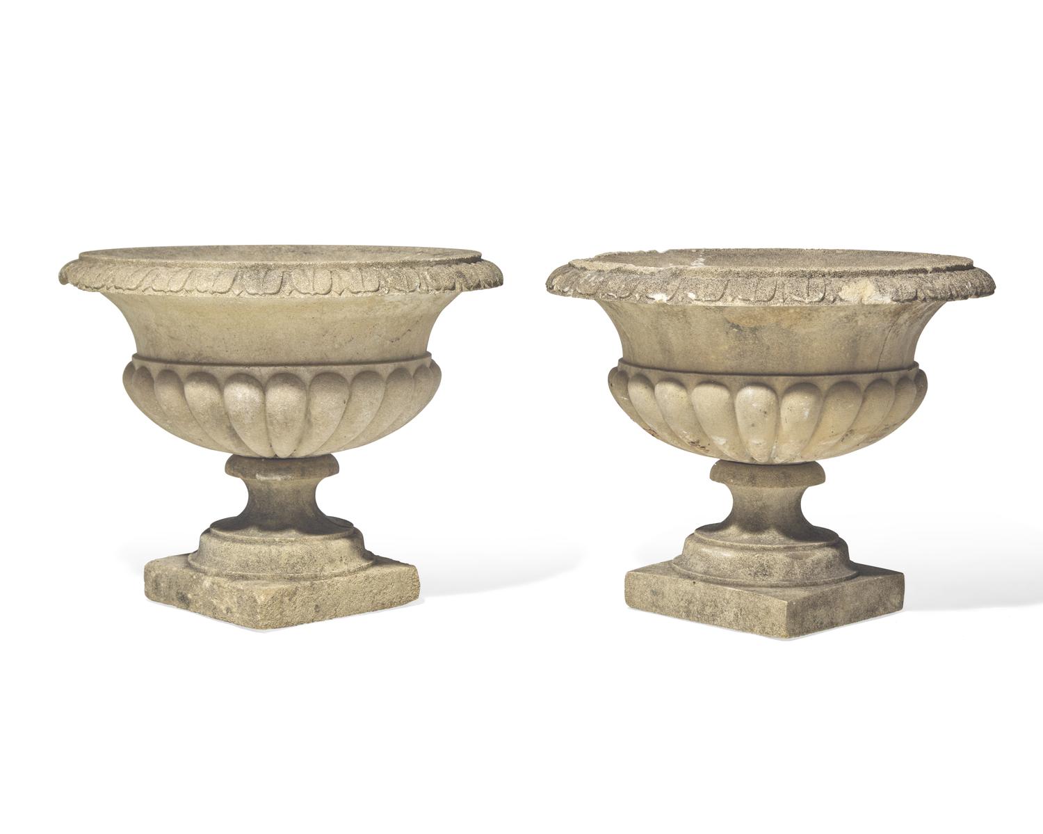 A pair of cast stone / concrete garden urns, 20th century