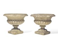 A pair of cast stone / concrete garden urns, 20th century