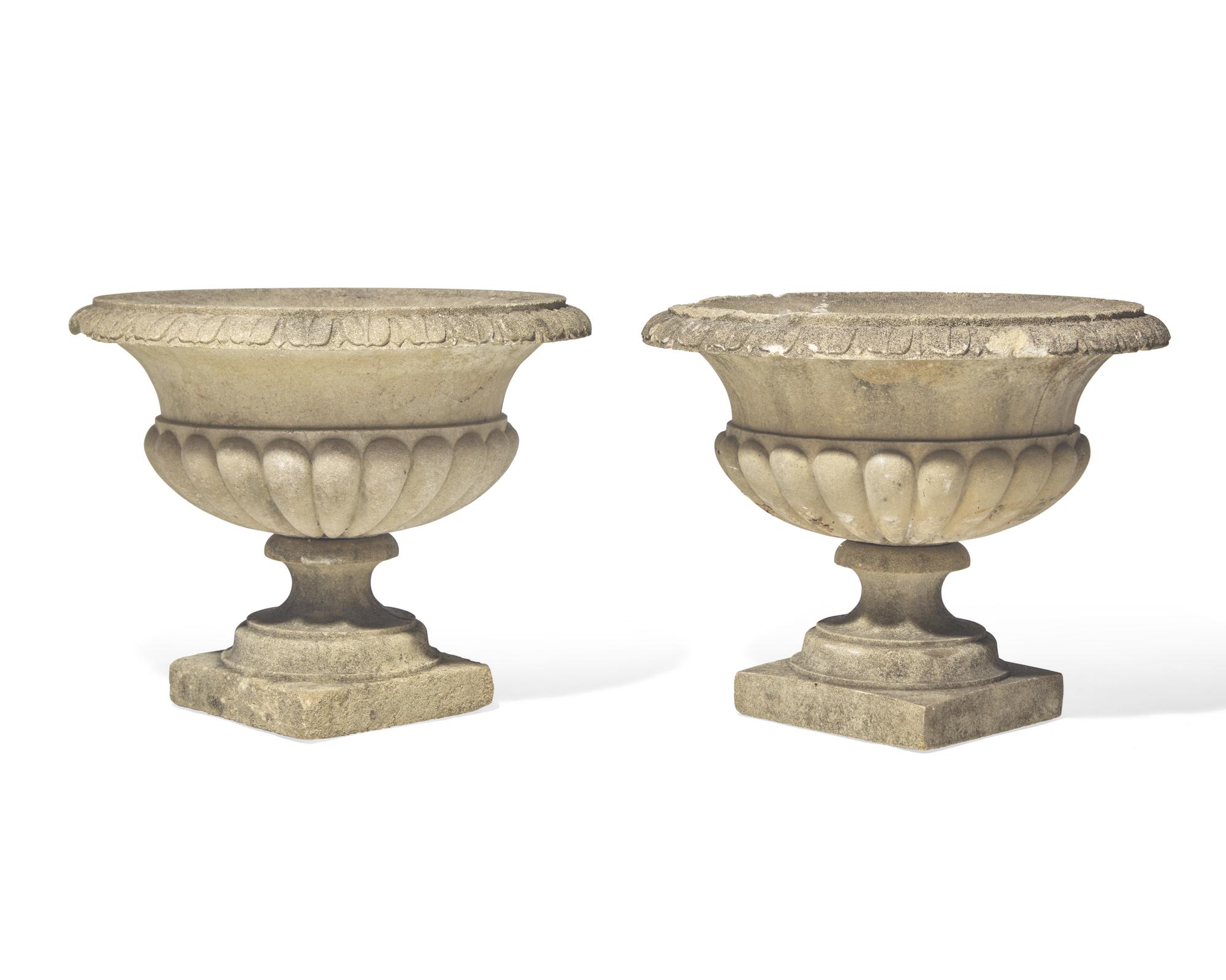 A pair of cast stone / concrete garden urns, 20th century