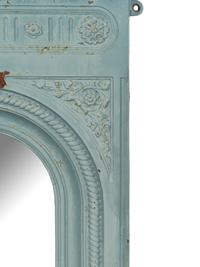 A Patinated Cast Iron Mirror