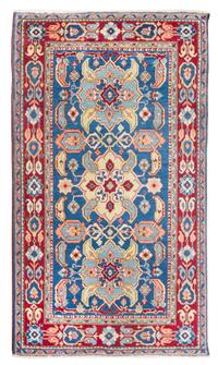 A Persian Wool Rug 5 feet 10 inches x 3 feet 5 inches.