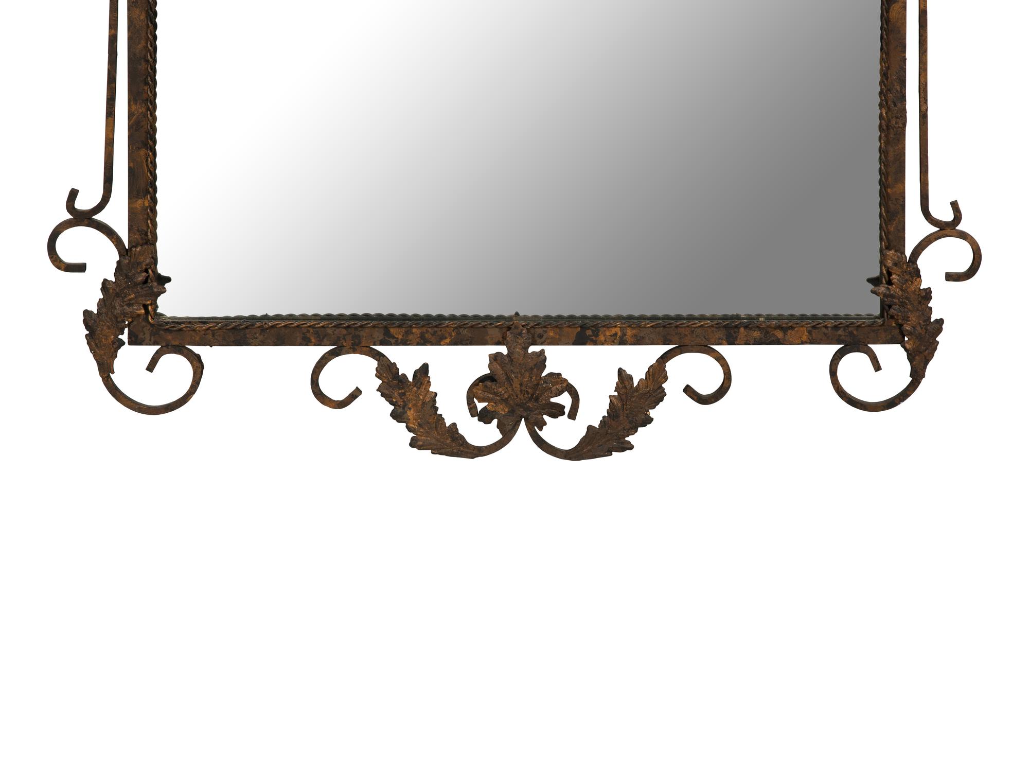 A Whimsical Patinated and Parcel Gilt Metal Framed Mirror