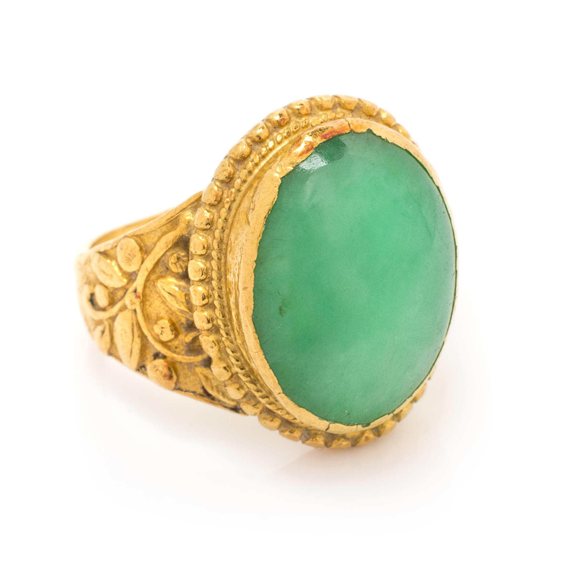 A 24 Karat Yellow Gold and Jade Ring, 7.70 dwts.
