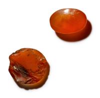 A Mycenean Carnelian Intaglio with a Stag and a Roman Carnelian Intaglio with a Racing Deer