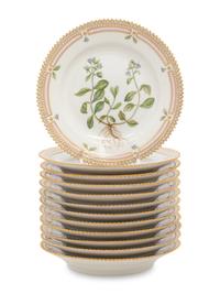 A Set of Twelve Royal Copenhagen Flora Danica Porcelain Bread Plates