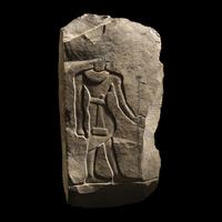 An Egyptian Limestone Sculptor's Trial-Piece