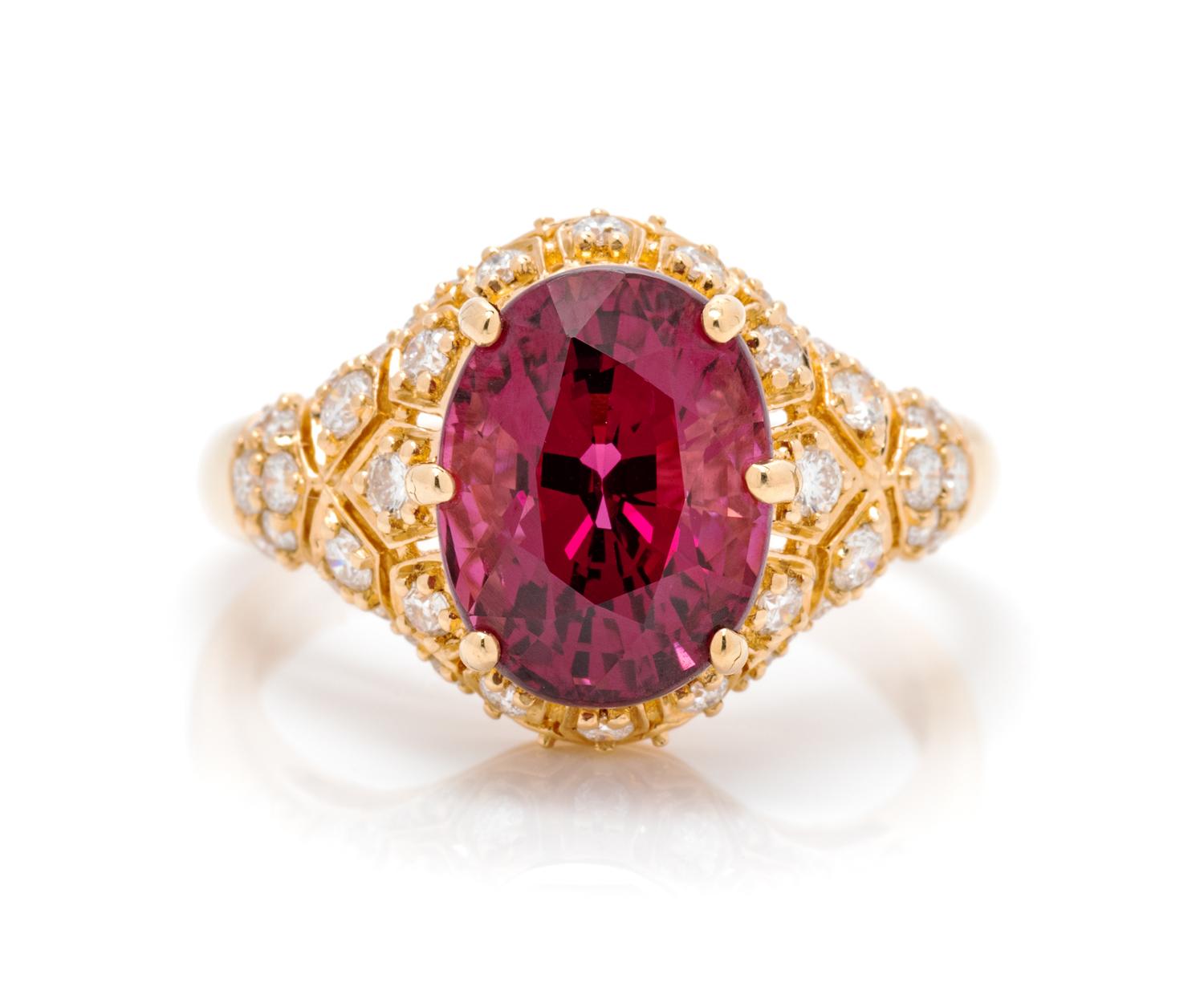 An 18 Karat Yellow Gold, Garnet and Diamond Ring, 4.30 dwts.