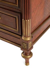 A Louis XVI Style Gilt Bronze Mounted Mahogany Marble-Top Commode