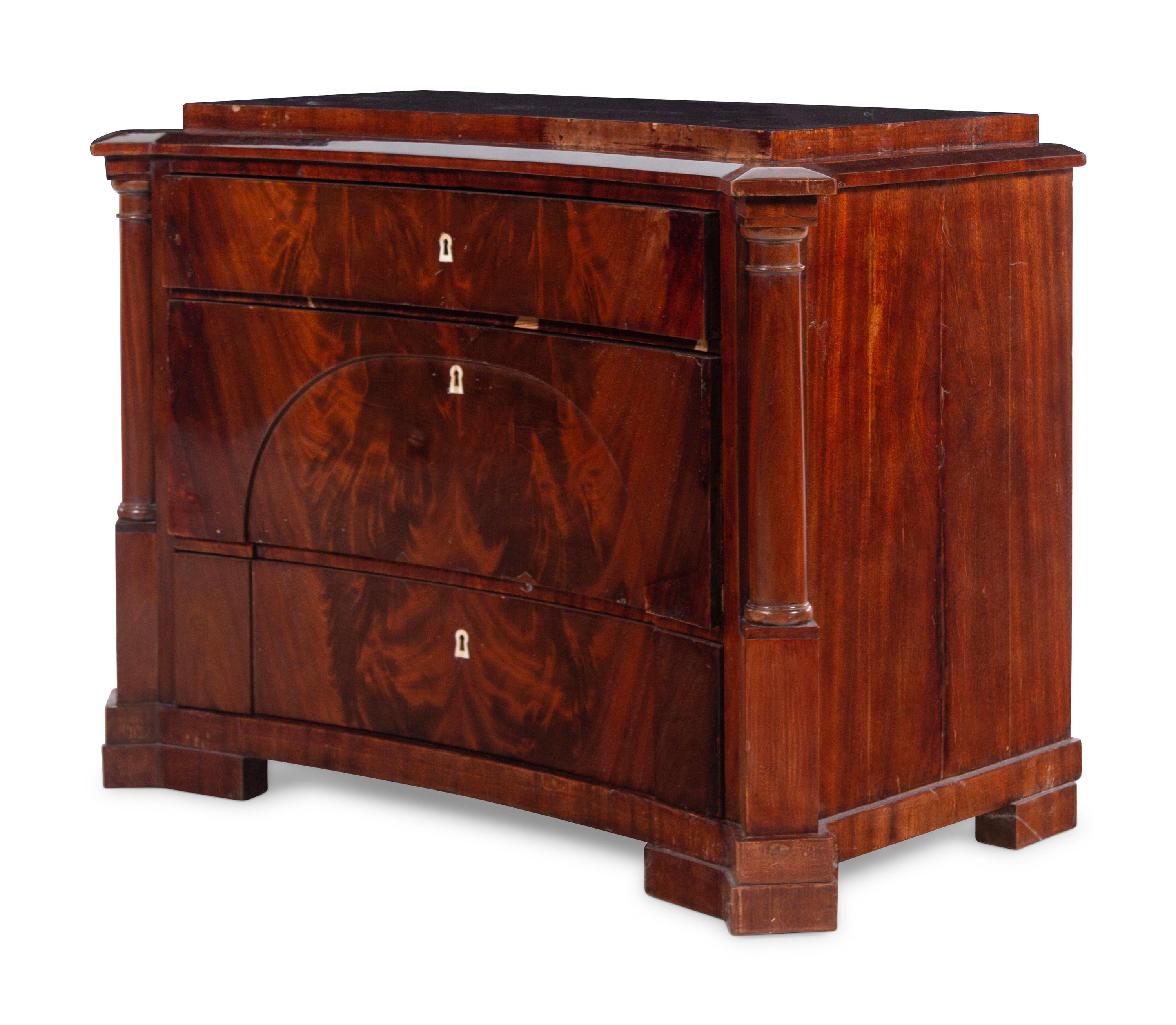 A German Mahogany Concave-Front Chest of Drawers