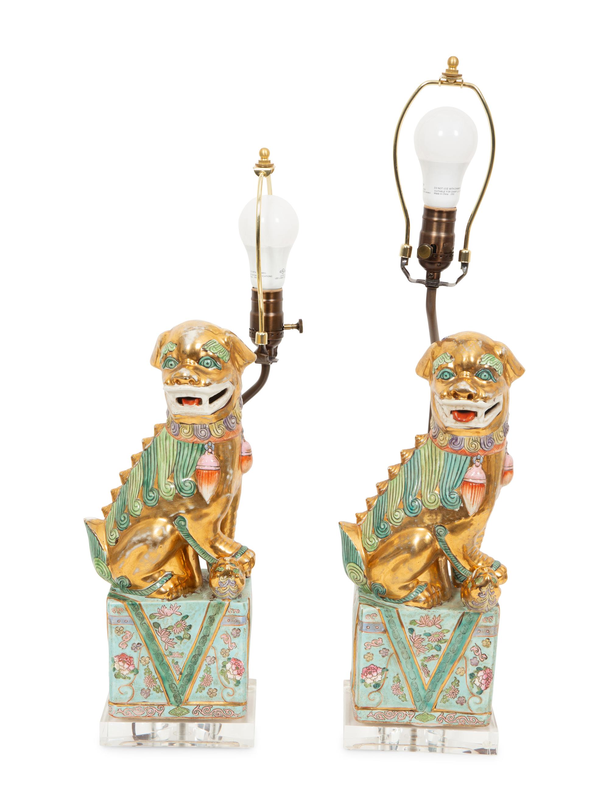 A Pair of Chinese Porcelain Foo Dog Table Lamps
