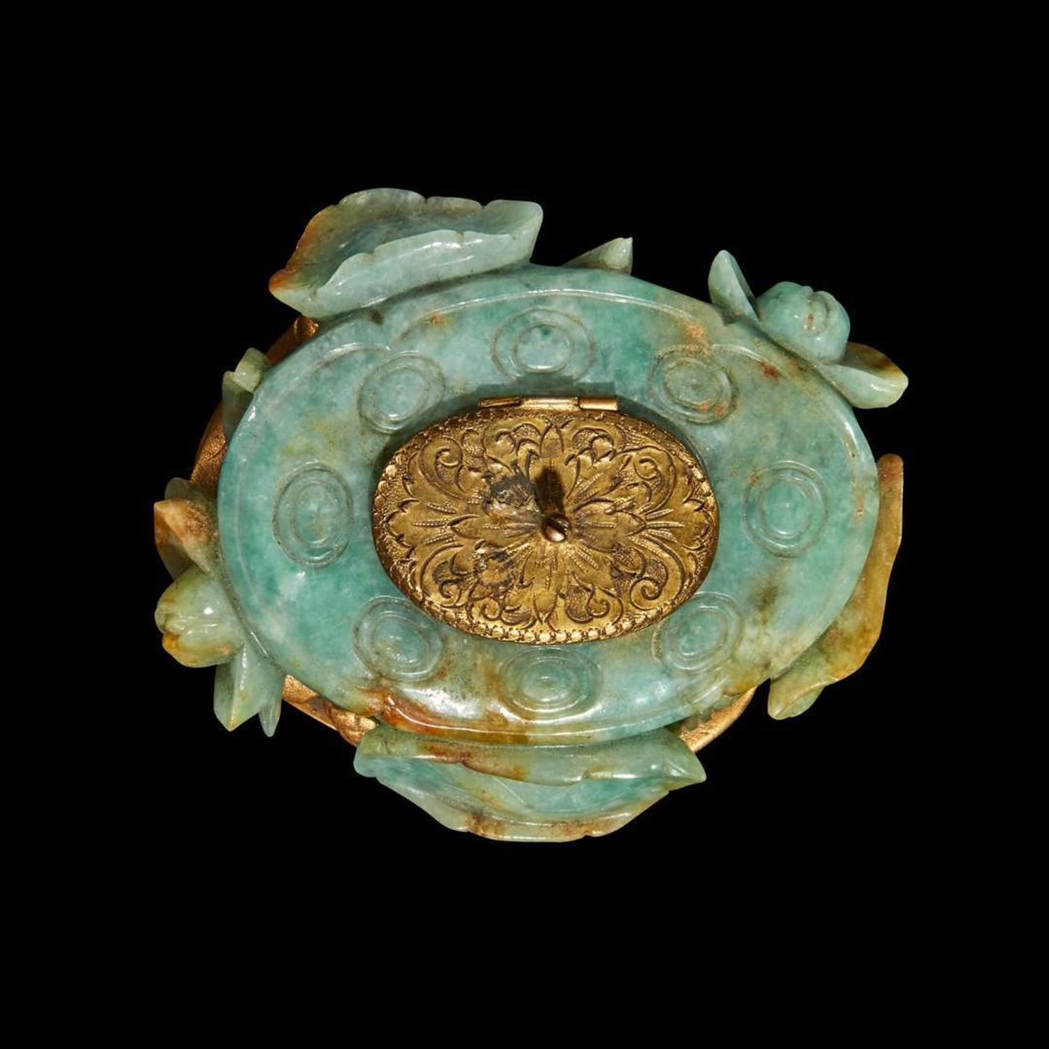 A Chinese carved jadeite meiren, a carved celadon jade meiren, and a carved jadeite lotus pod-form inkwell