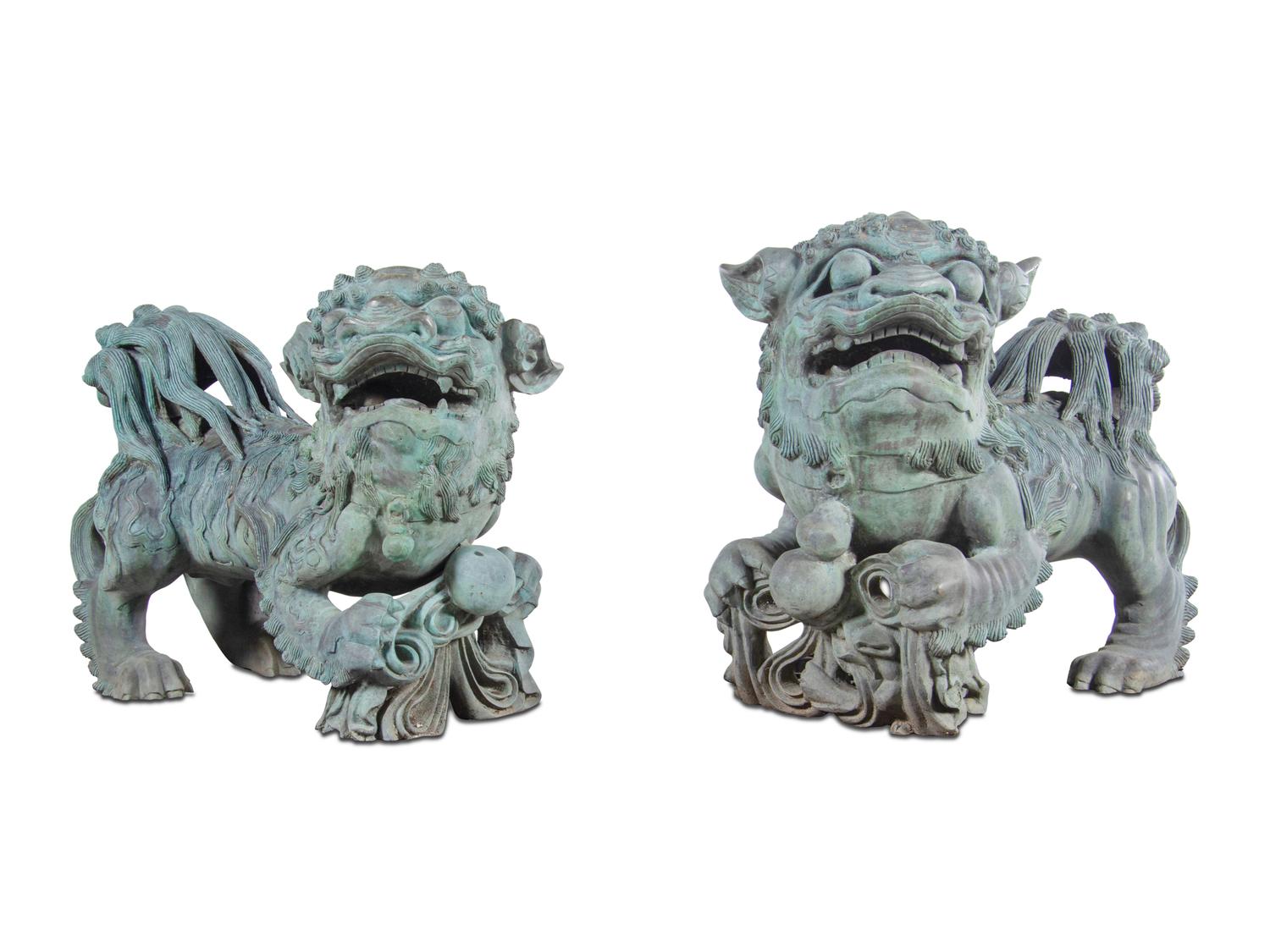 A Pair of Patinated Bronze Buddhistic Lions