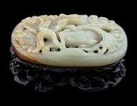 A Carved Celadon Jade 'Carp and Lotus' Plaque