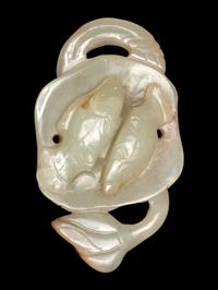 A Celadon Jade Carving of Lotus and Double Fish