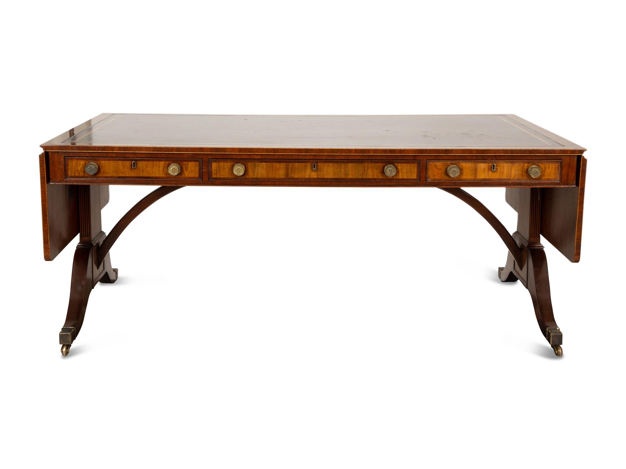 A William IV Style Walnut Library Table