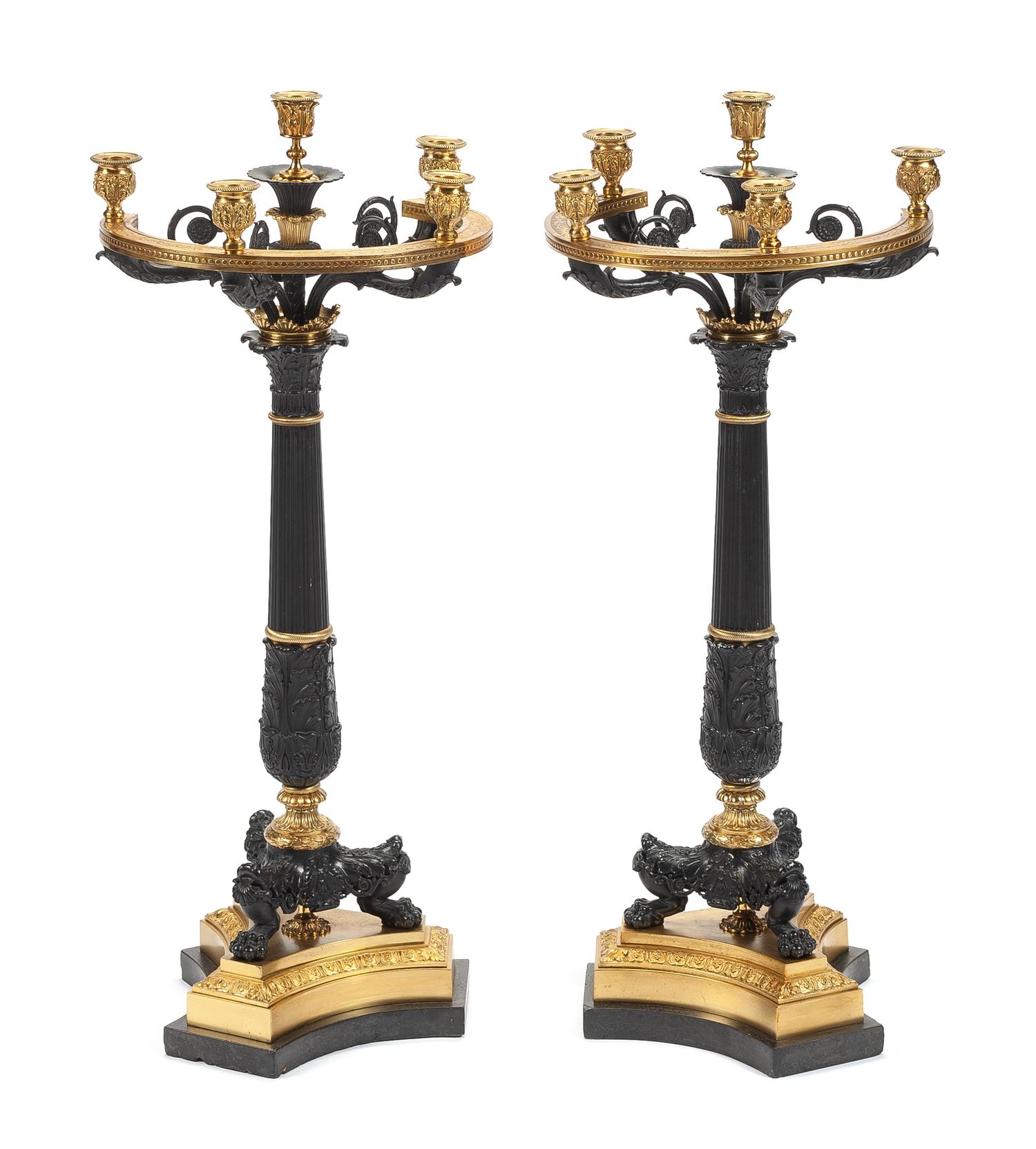 A Pair of Empire Style Gilt and Patinated Bronze Five-Light Candelabra Height 32 x width 13 x depth 11 inches.