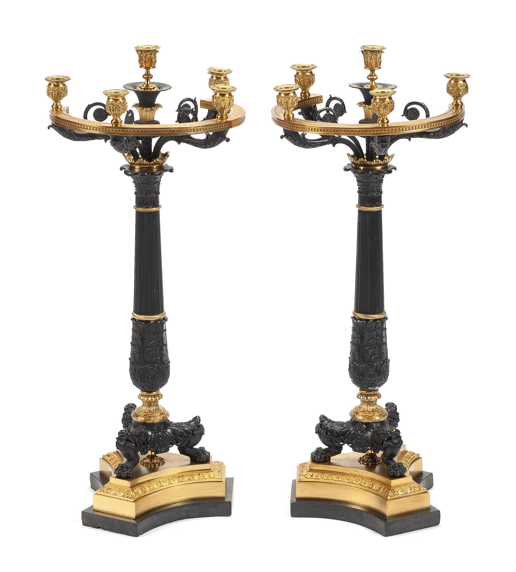 A Pair of Empire Style Gilt and Patinated Bronze Five-Light Candelabra Height 32 x width 13 x depth 11 inches.
