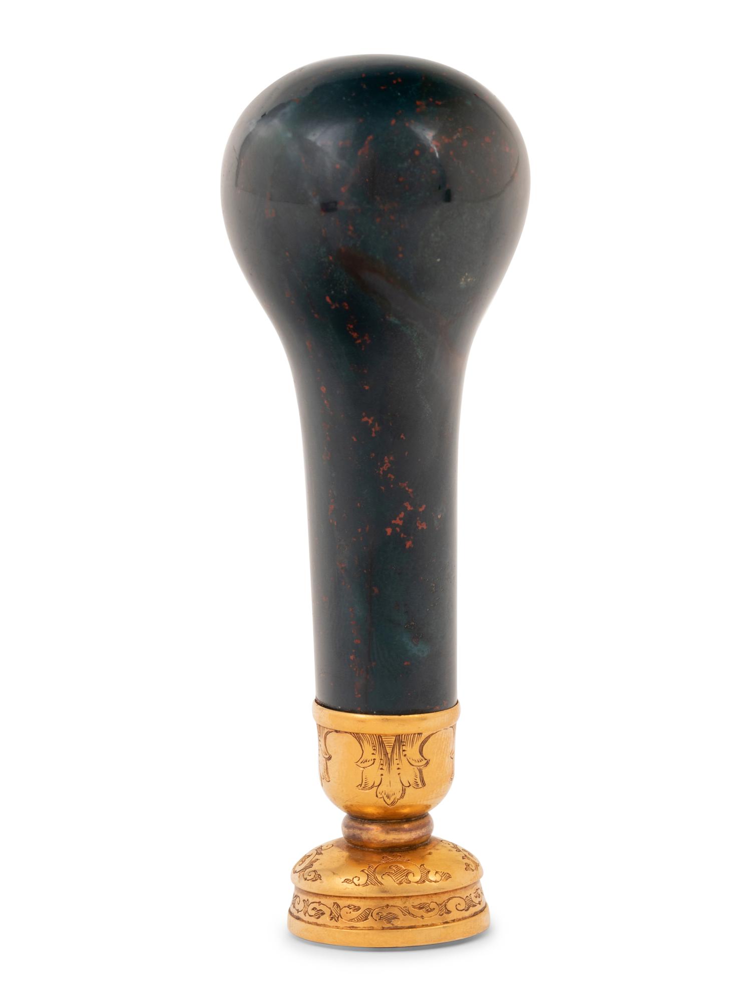 A Continental 18-Karat Gold-Mounted Bloodstone Hand Seal