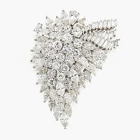 A diamond and white gold pendant/brooch