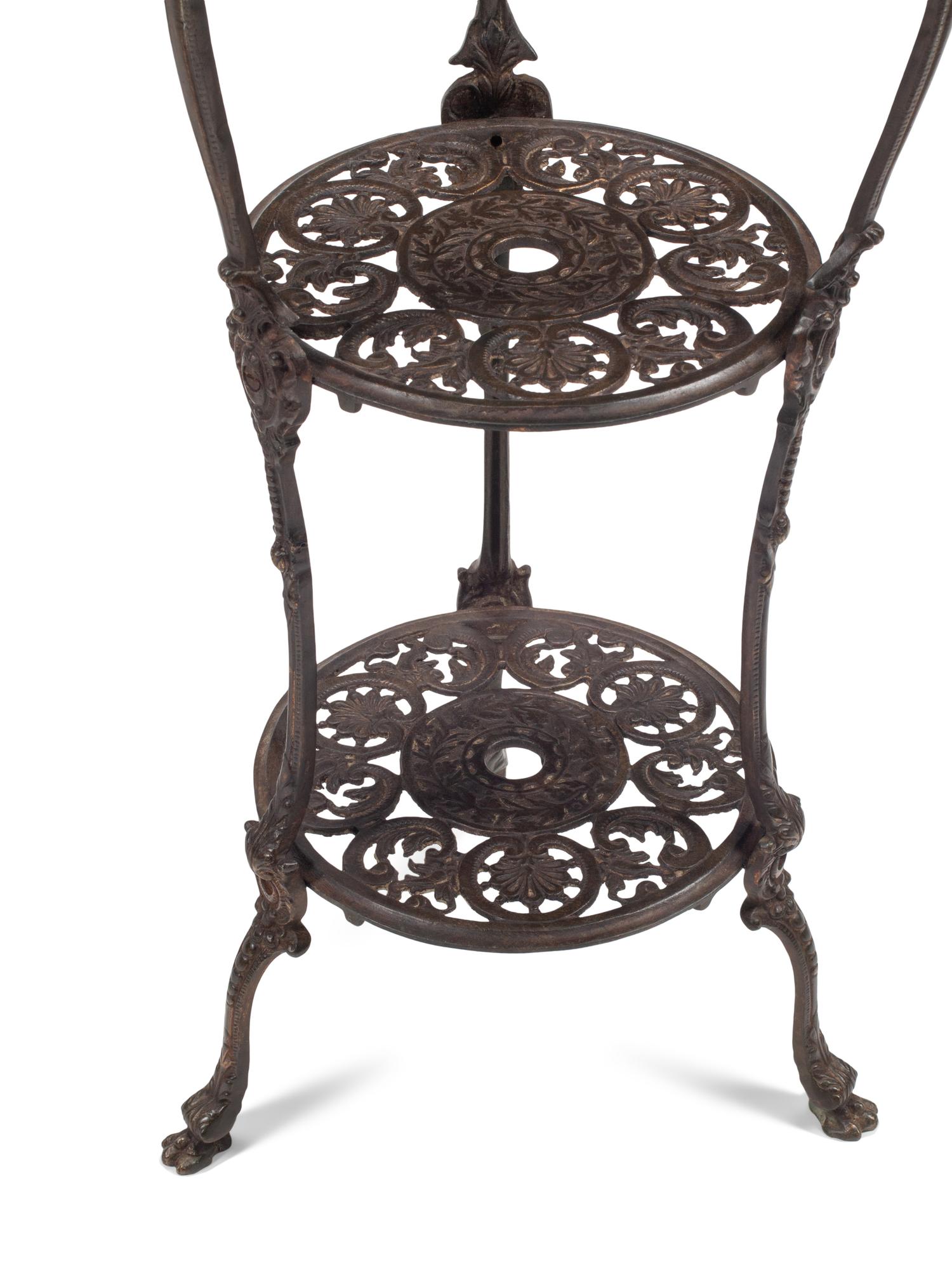 A Pair of Louis XV Style Bronze Three-Tier Figural Stands
