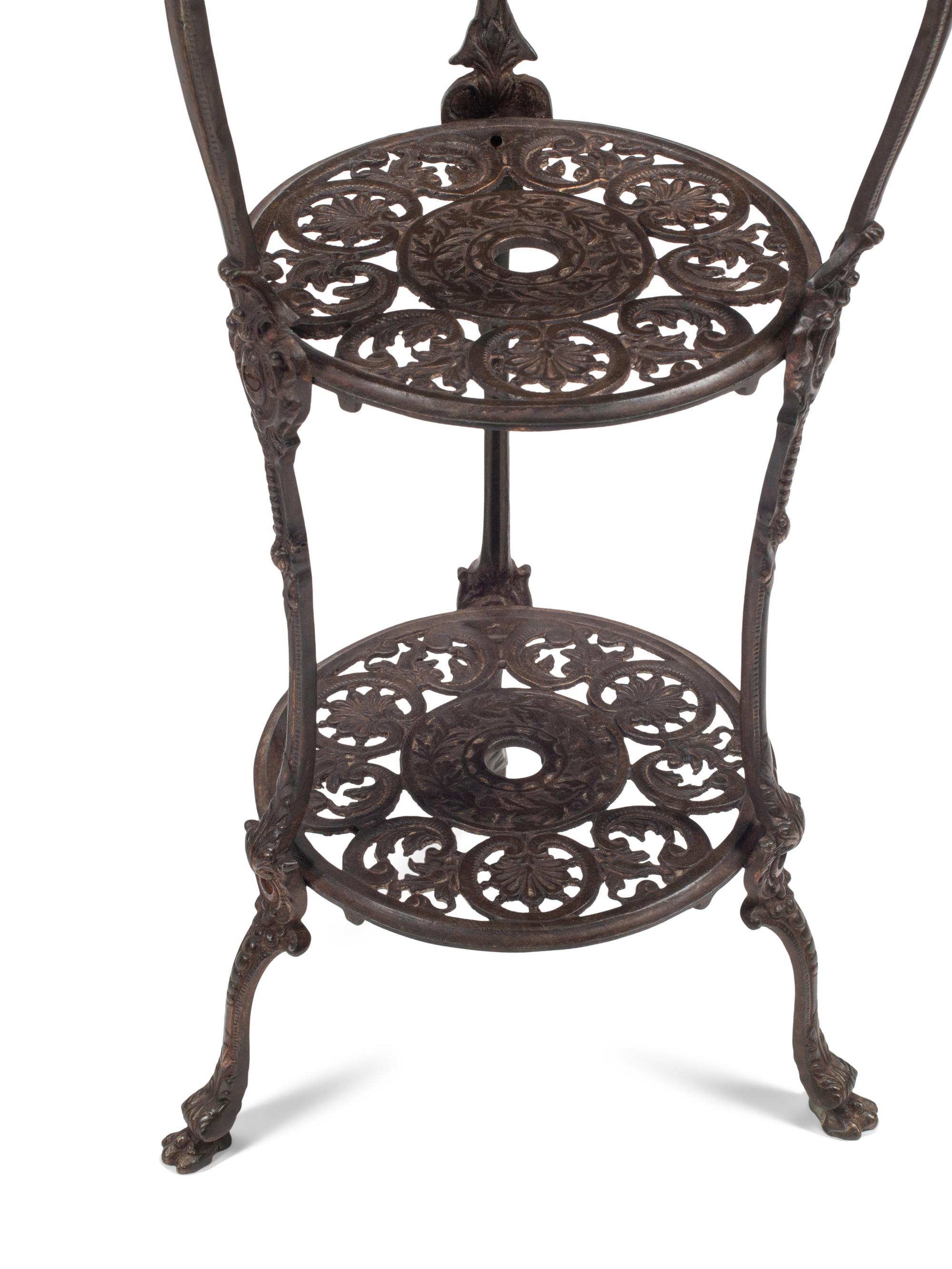 A Pair of Louis XV Style Bronze Three-Tier Figural Stands
