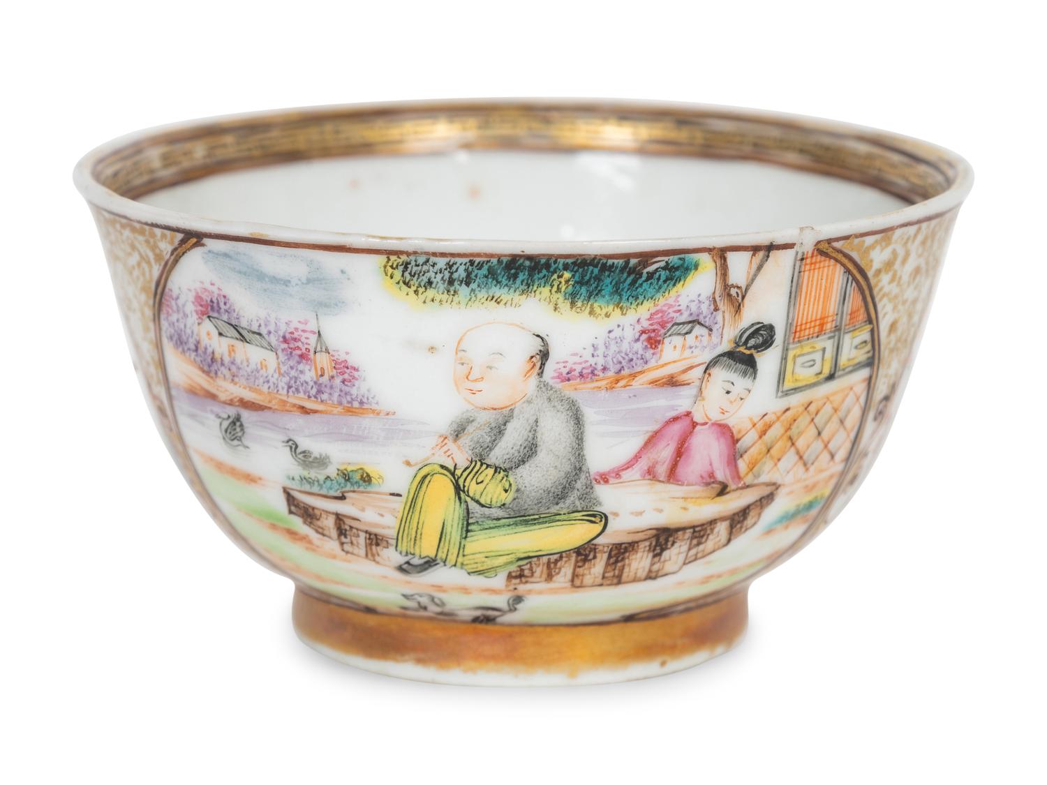 A Chinese Export Porcelain Famille Rose Cup and Saucer