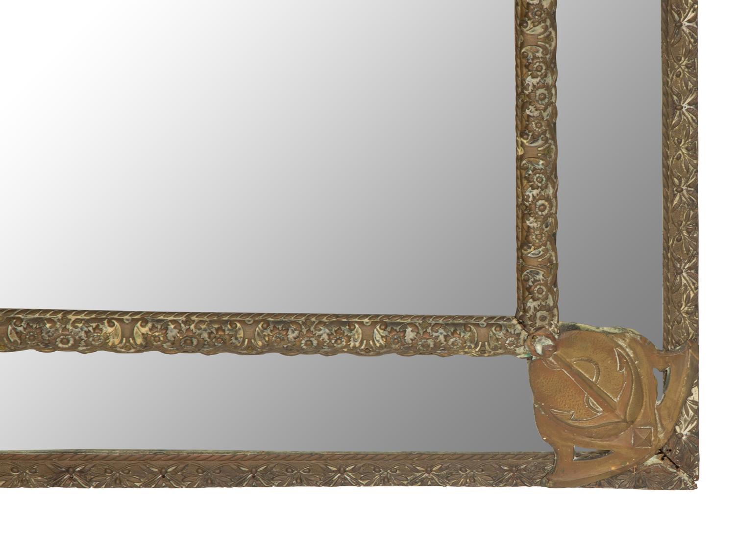 A Dutch Chased Brass Cushion Mirror with Nautical Motif