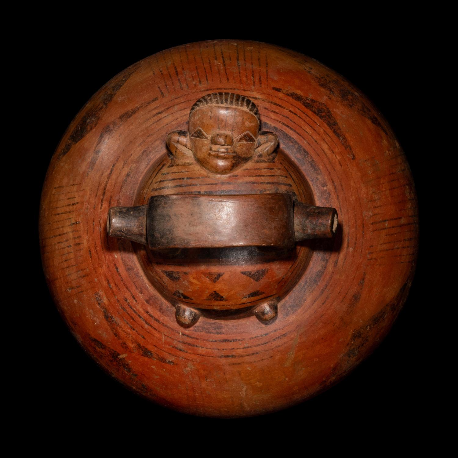 A Calima Redware Anthropomorphic Alcarraza
