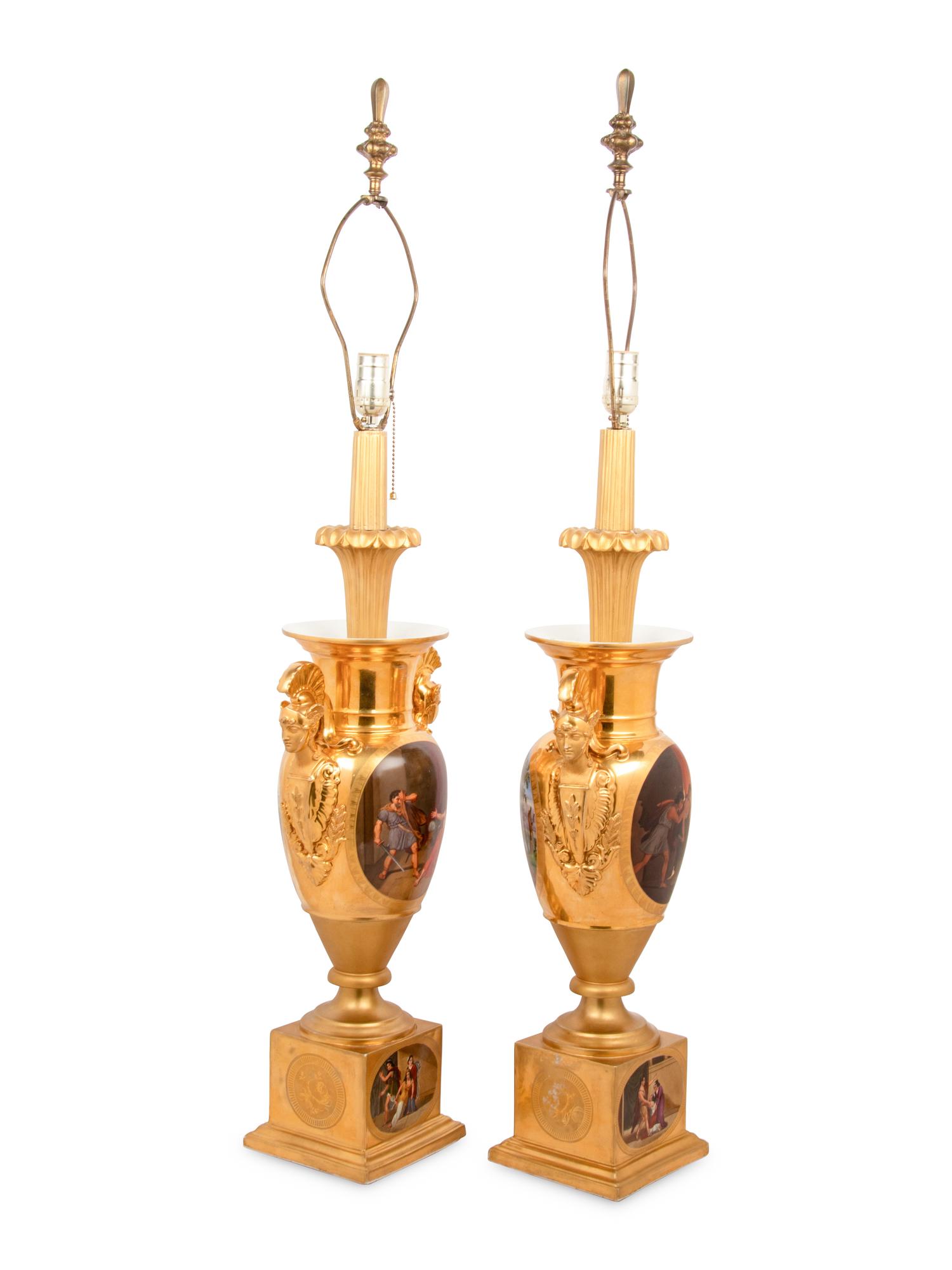 A Pair of Empire Style Painted and Parcel Gilt Porcelain Urns
