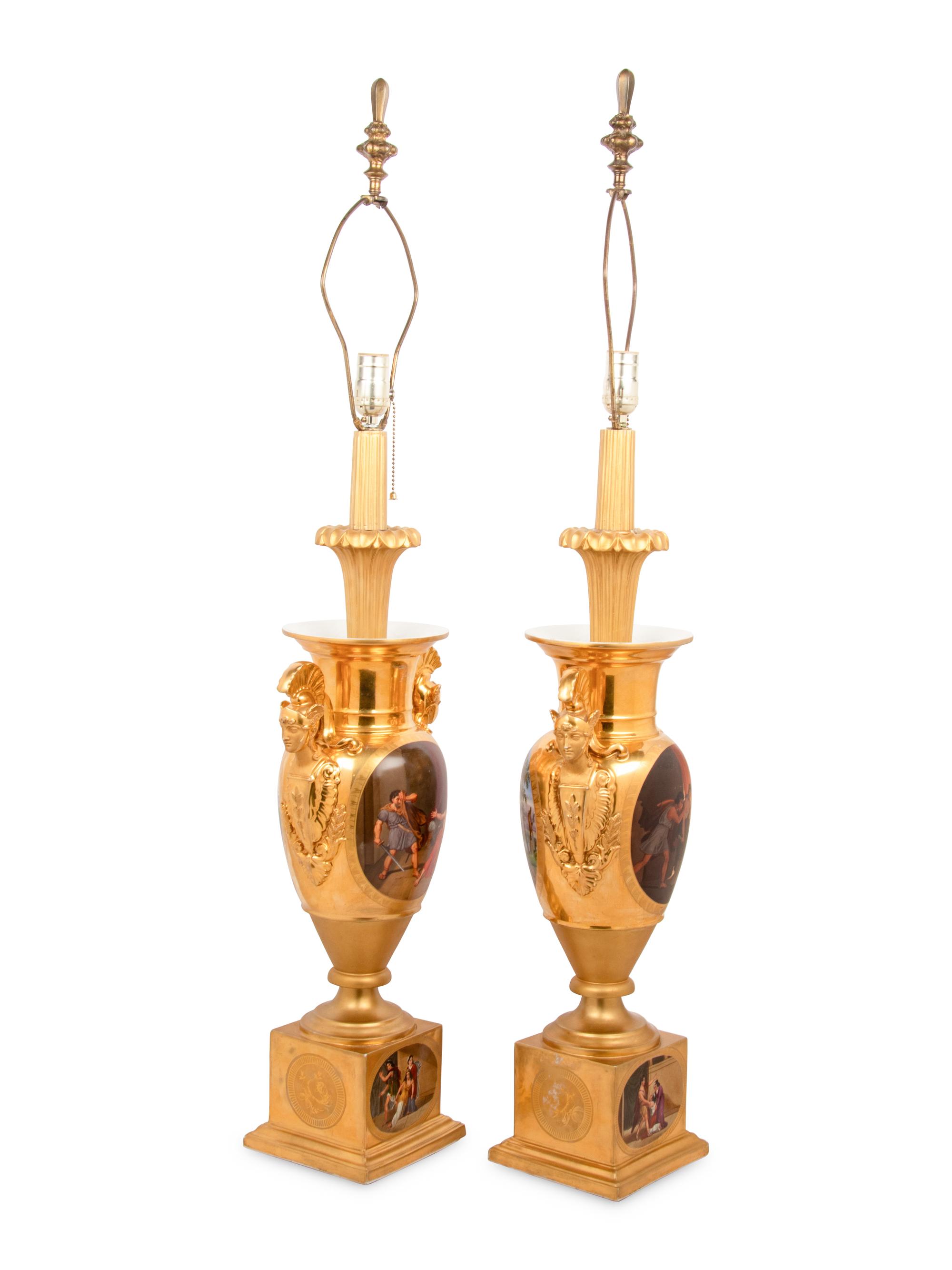 A Pair of Empire Style Painted and Parcel Gilt Porcelain Urns