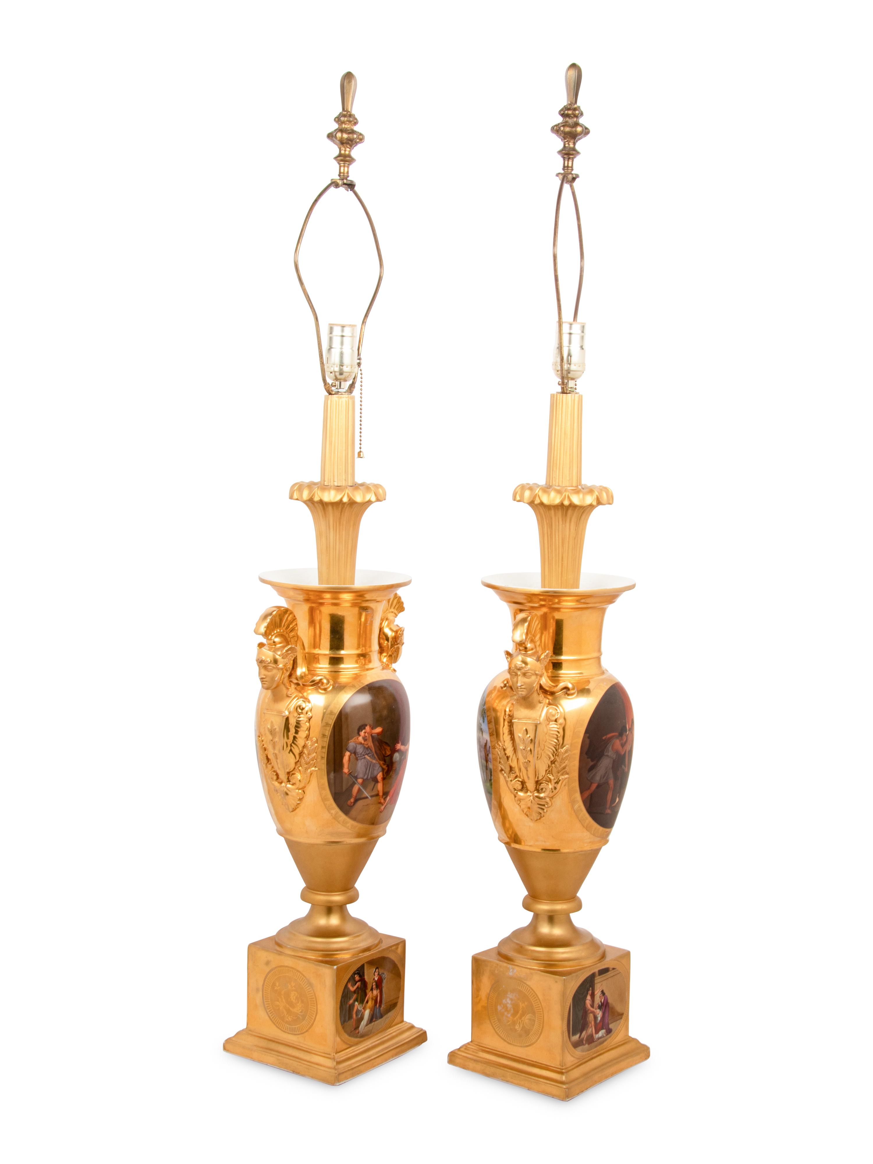 A Pair of Empire Style Painted and Parcel Gilt Porcelain Urns