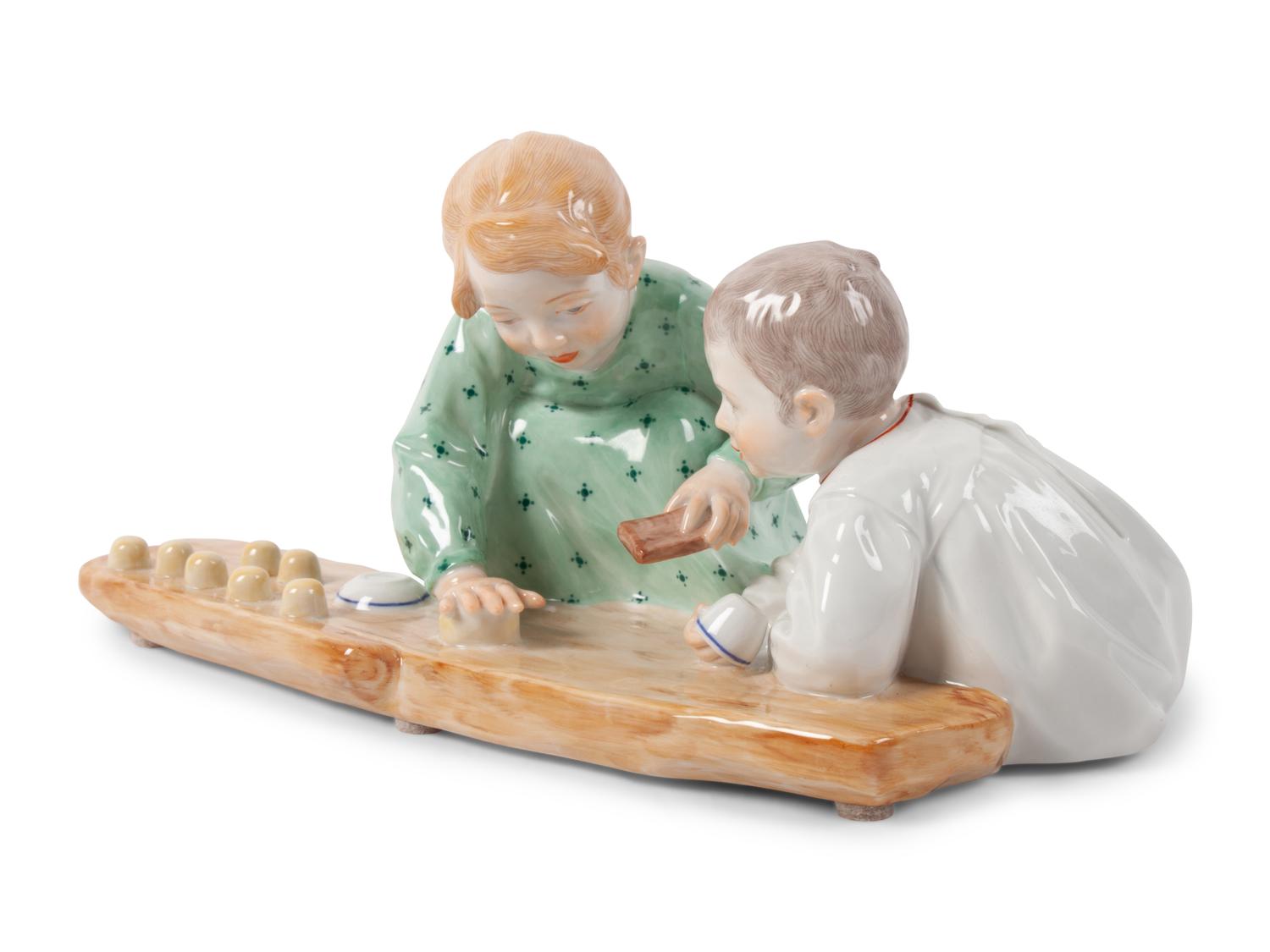 A Meissen Porcelain Figural Group of Children Playing in Sand