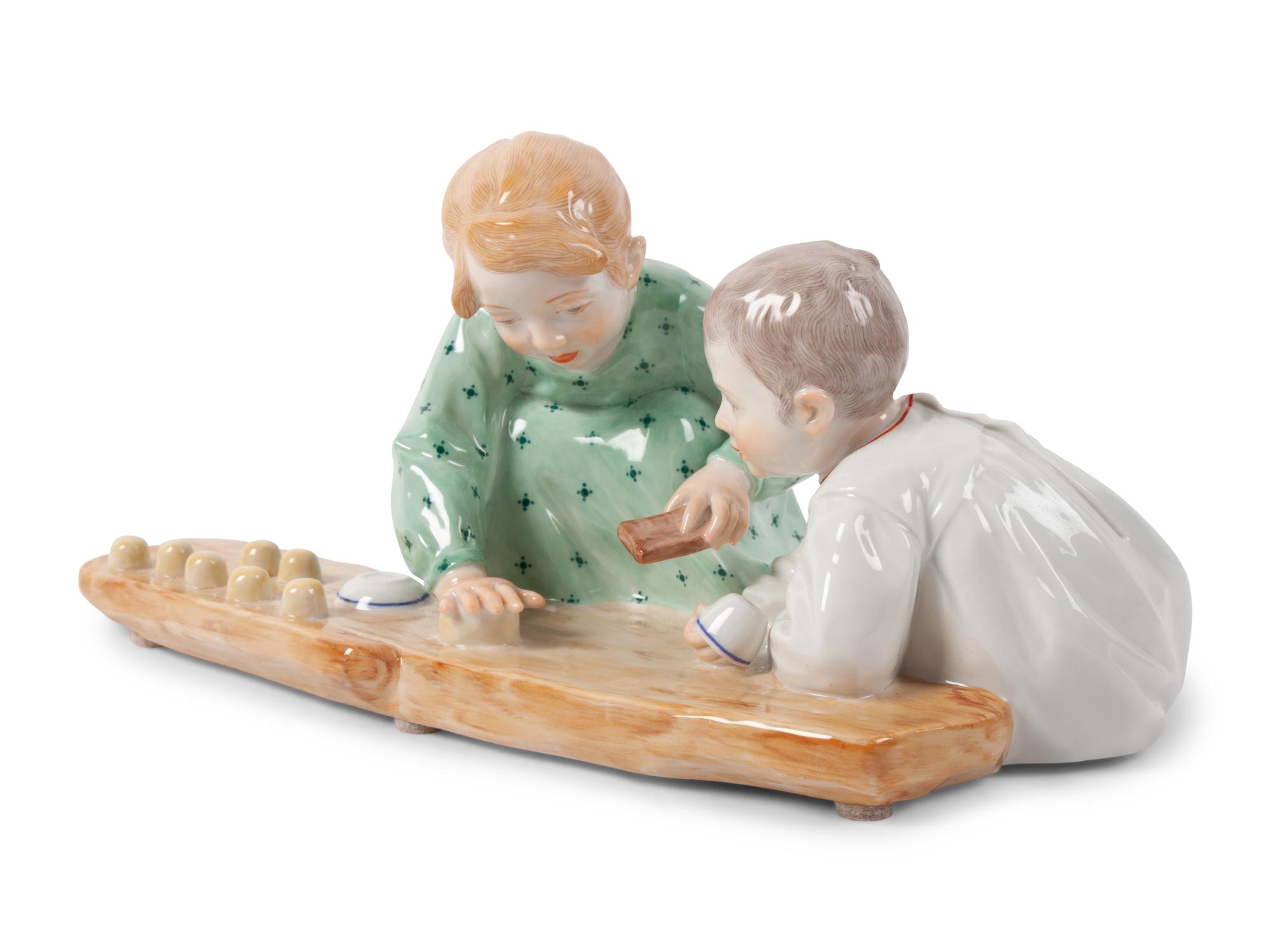 A Meissen Porcelain Figural Group of Children Playing in Sand