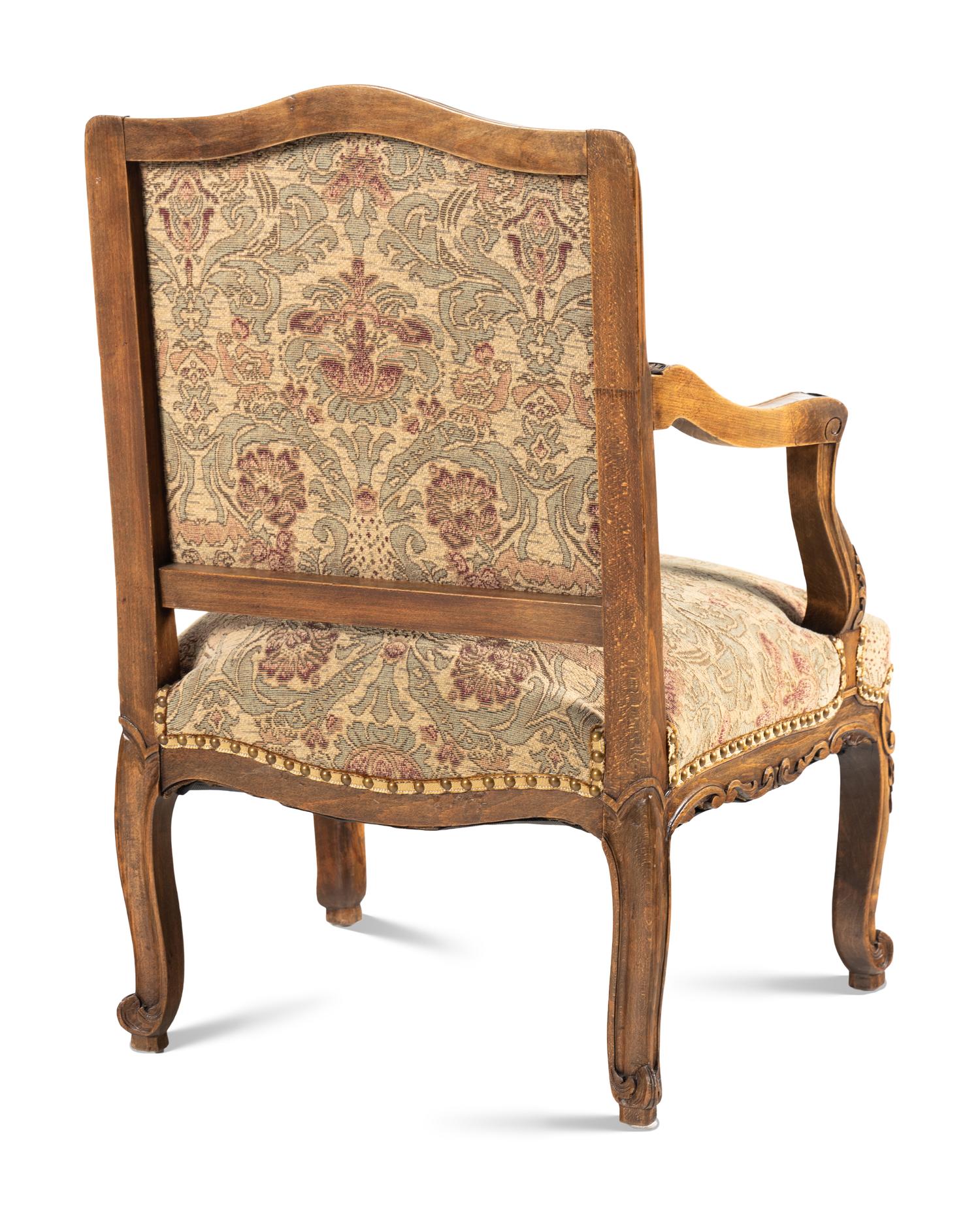 A Louis XV Style Walnut Fauteuil