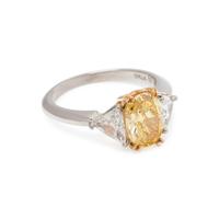 TREATED FANCY INTENSE YELLOW DIAMOND AND DIAMOND RING