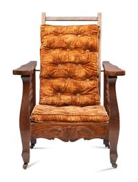 A Victorian Carved Mahogany and Tufted Velvet Upholstered Child's Reclining Armchair