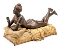 A Large Cold-Painted Metal Erotic Figure of a Reclining Woman