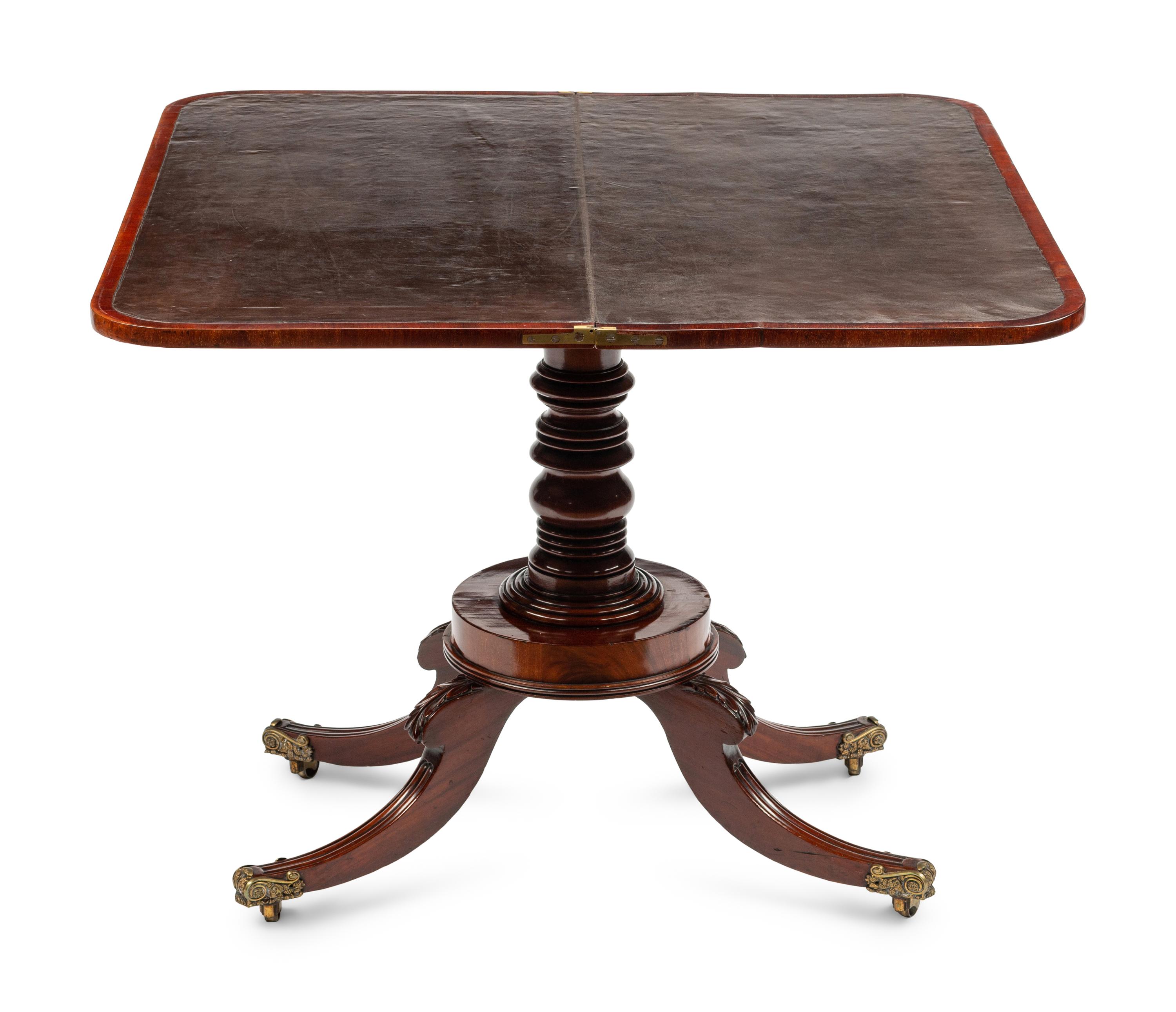 A Regency Crossbanded Mahogany Flip-Top Table