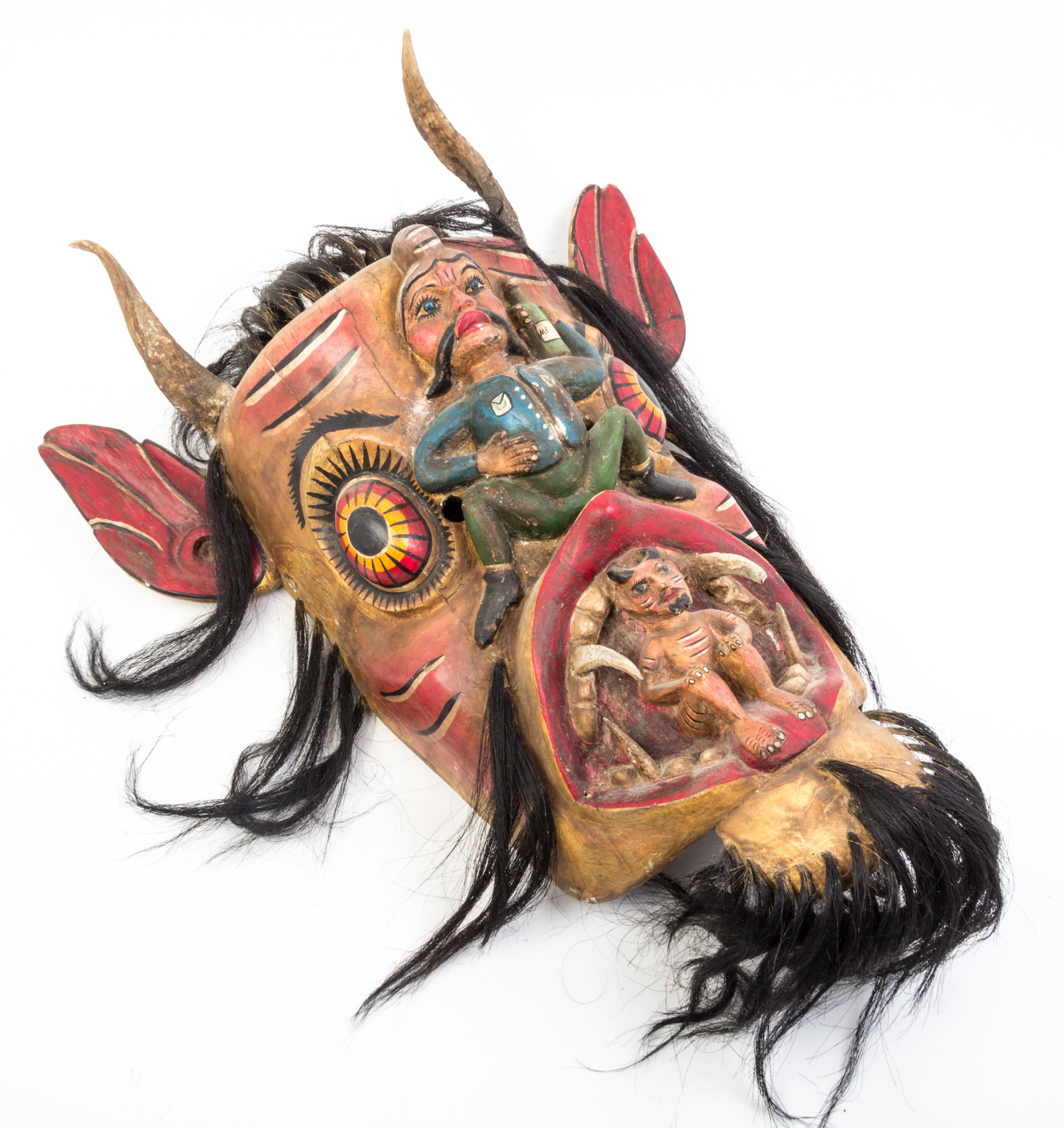 Two Mexican Painted Masks Height of taller 32 inches.
