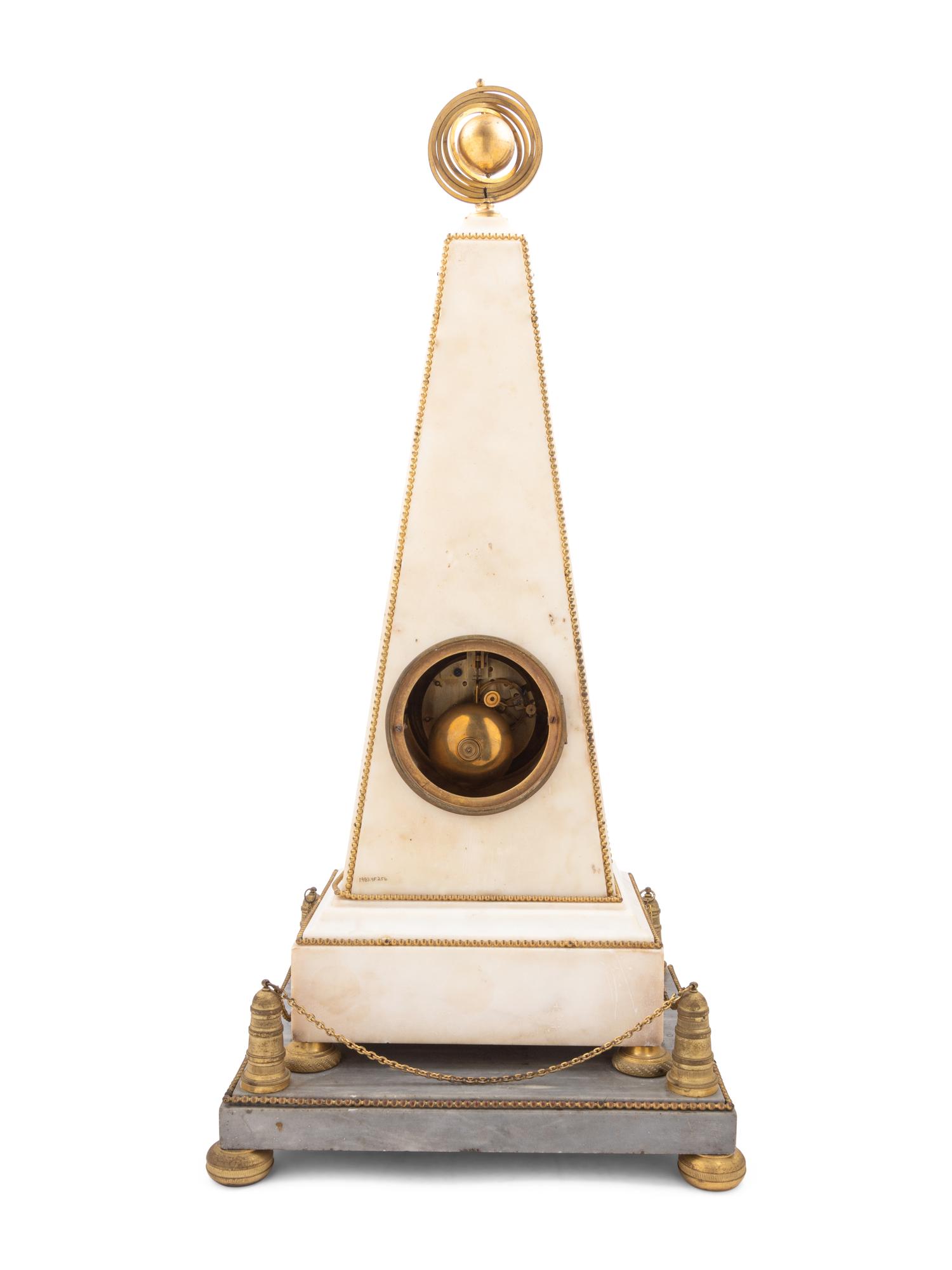 A Late Louis XVI or Directoire Gilt Bronze and Marble Obelisk Clock and Stand