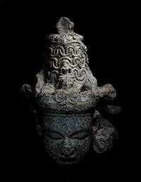 An Indian Carved Black Stone Head of a Vishnu