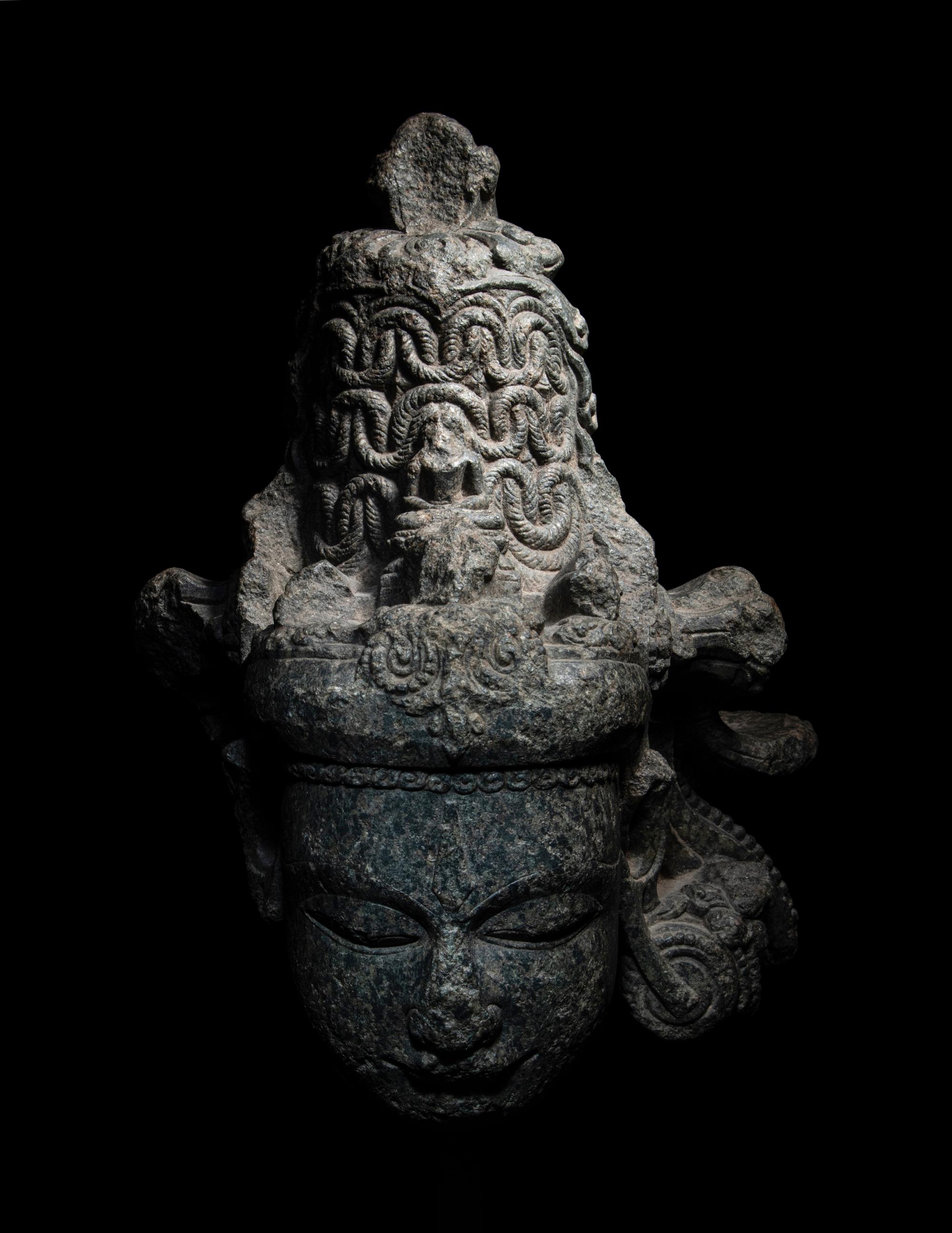 An Indian Carved Black Stone Head of a Vishnu