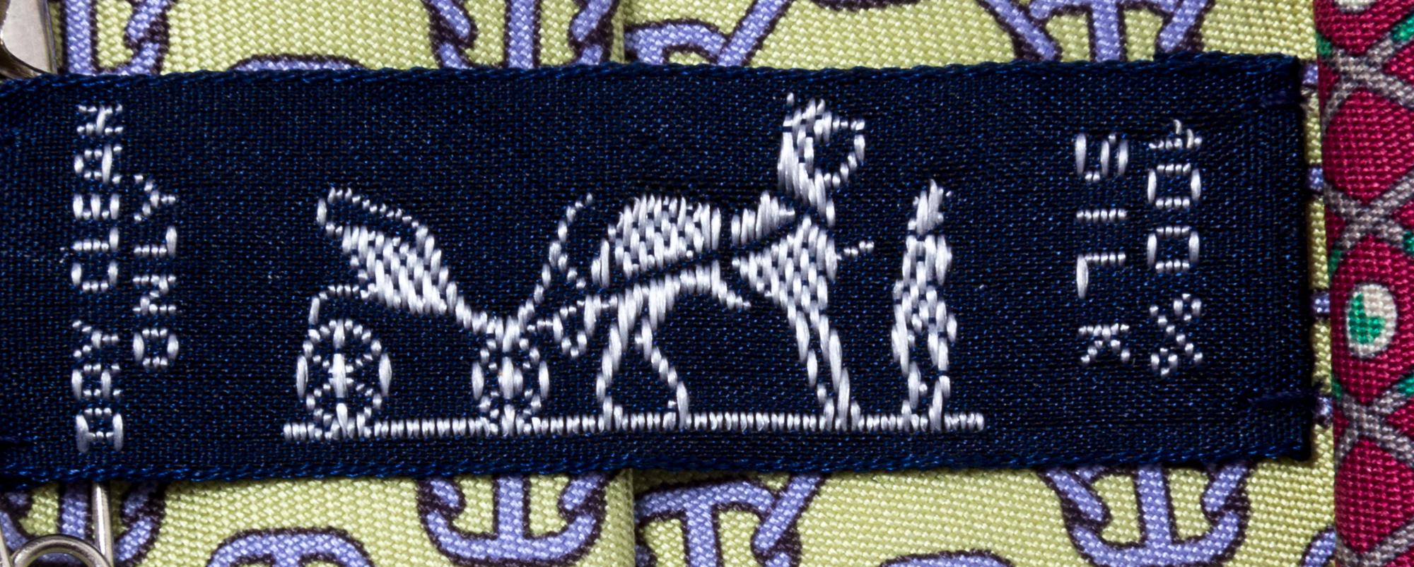 A Group of Three Hermès Silk Ties,