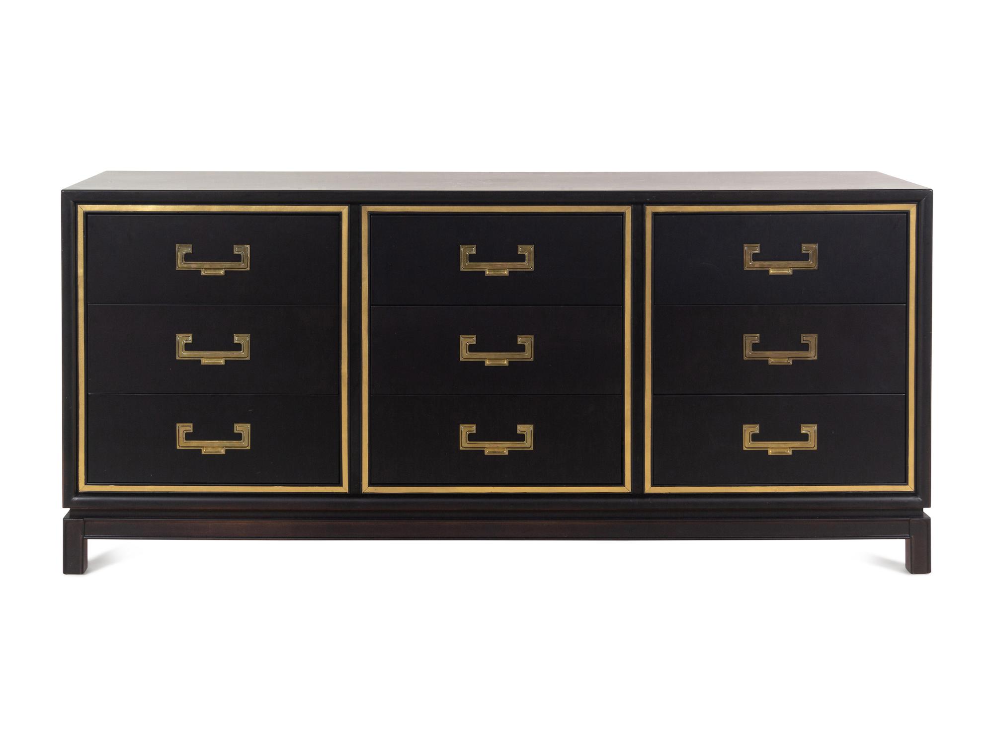 A Contemporary "Hollywood Regency" Style Brass Mounted Ebonized Chest of Drawers
