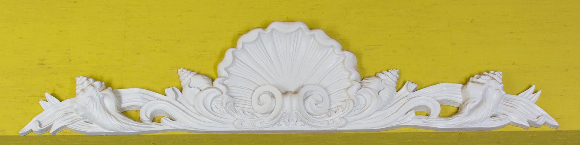 A Continental Carved Composite Shell-Form Wall Mount Height 12 x width 55 1/2 inches. — 20TH CENTURY