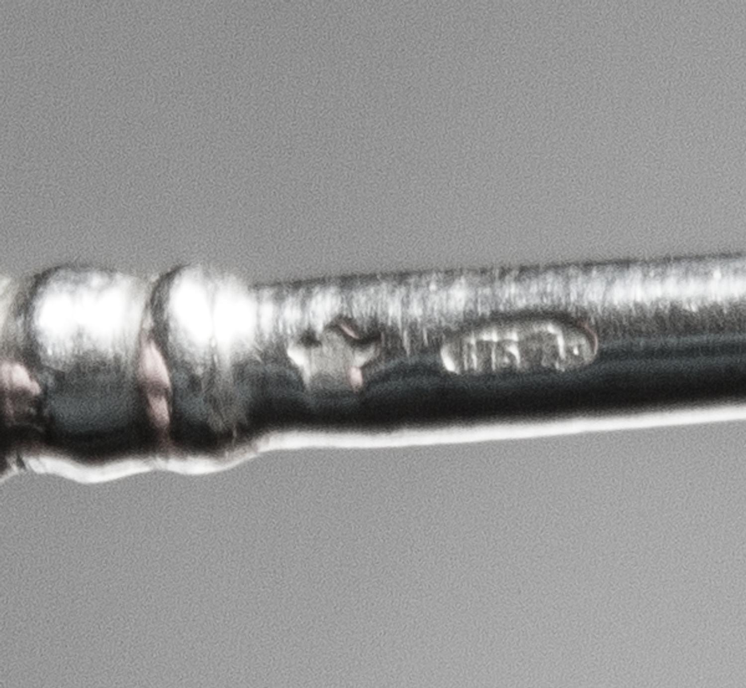 A Set of Six Russian Niello Silver Teaspoons, Maker's marks obscured, Moscow, late 19th/early 20th century, each having a knopped stem,